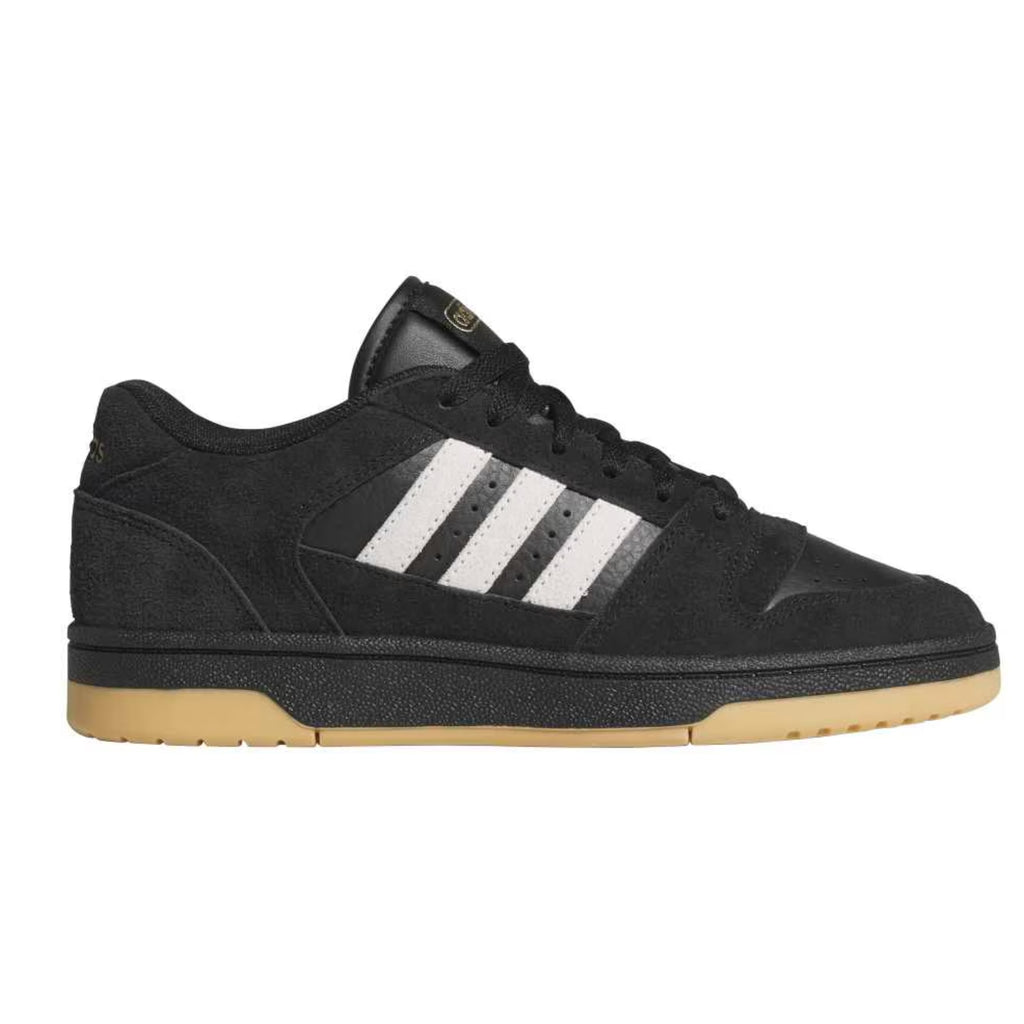 tenis Adidas Break Start Premium Low en color negro con suela de goma.
