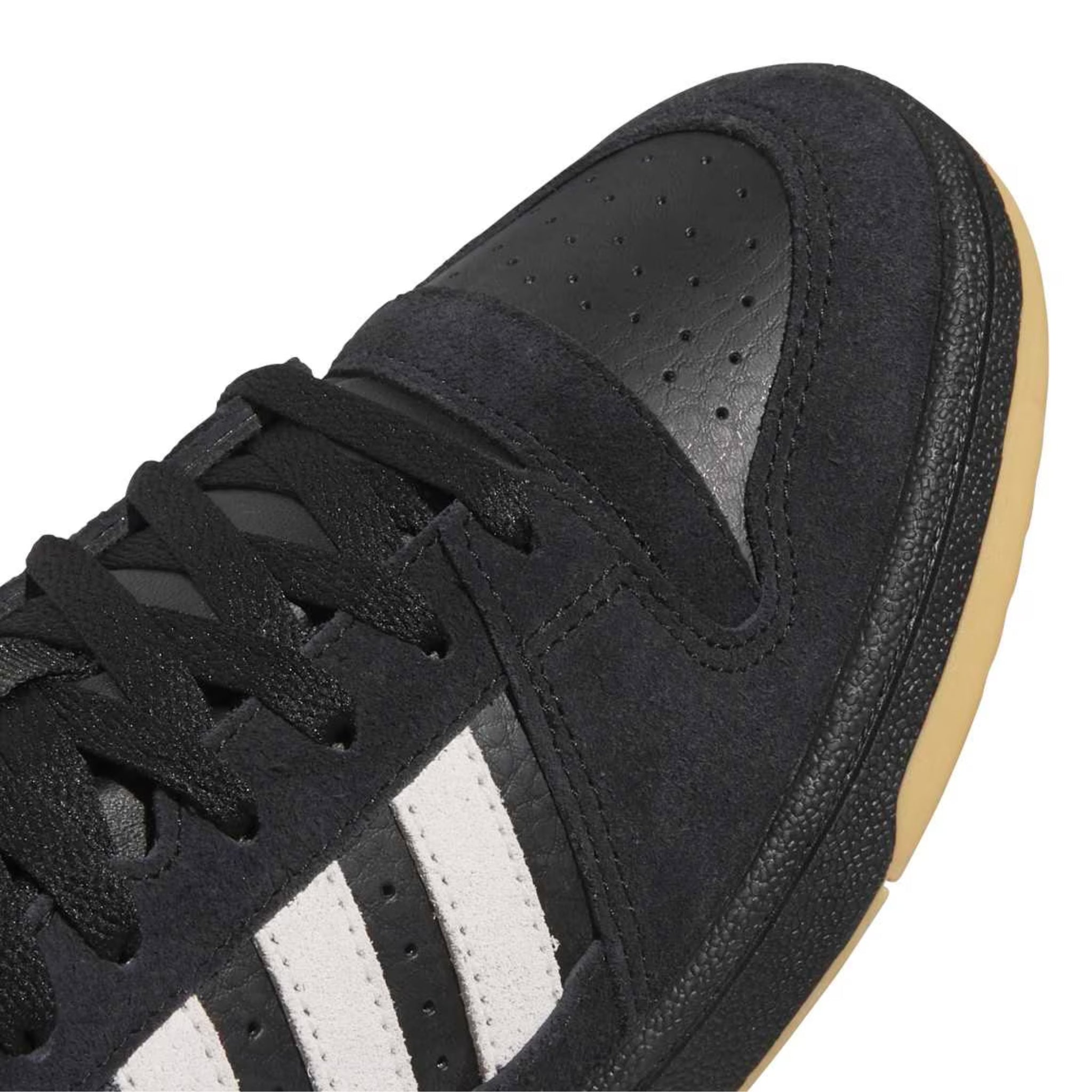 tenis Adidas Break Start Premium Low en color negro con suela de goma.